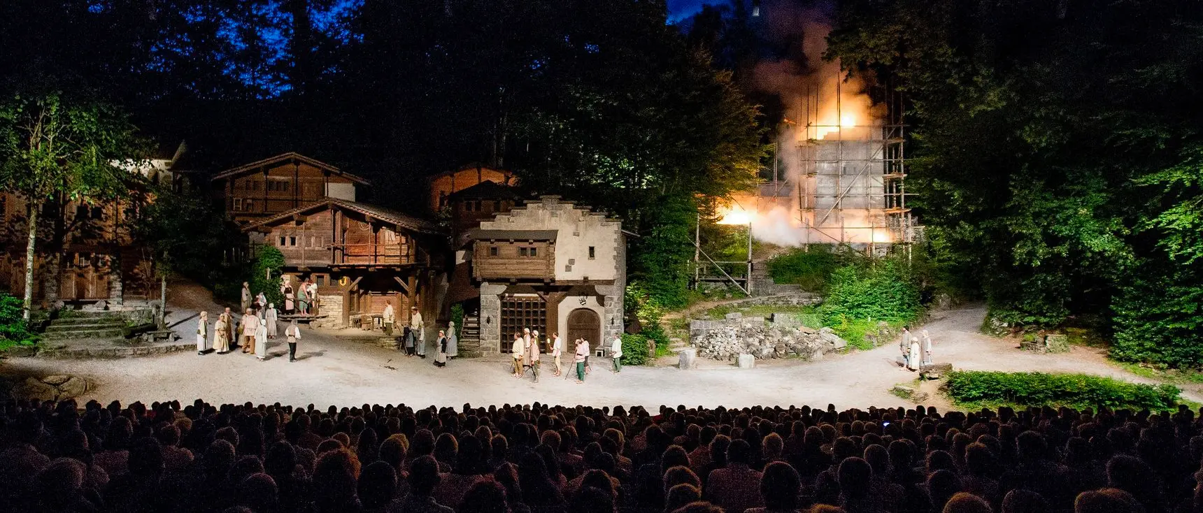 William Tell Tellspiele open-air theatre performance at night with full audience, Interlaken Switzerland summer festival