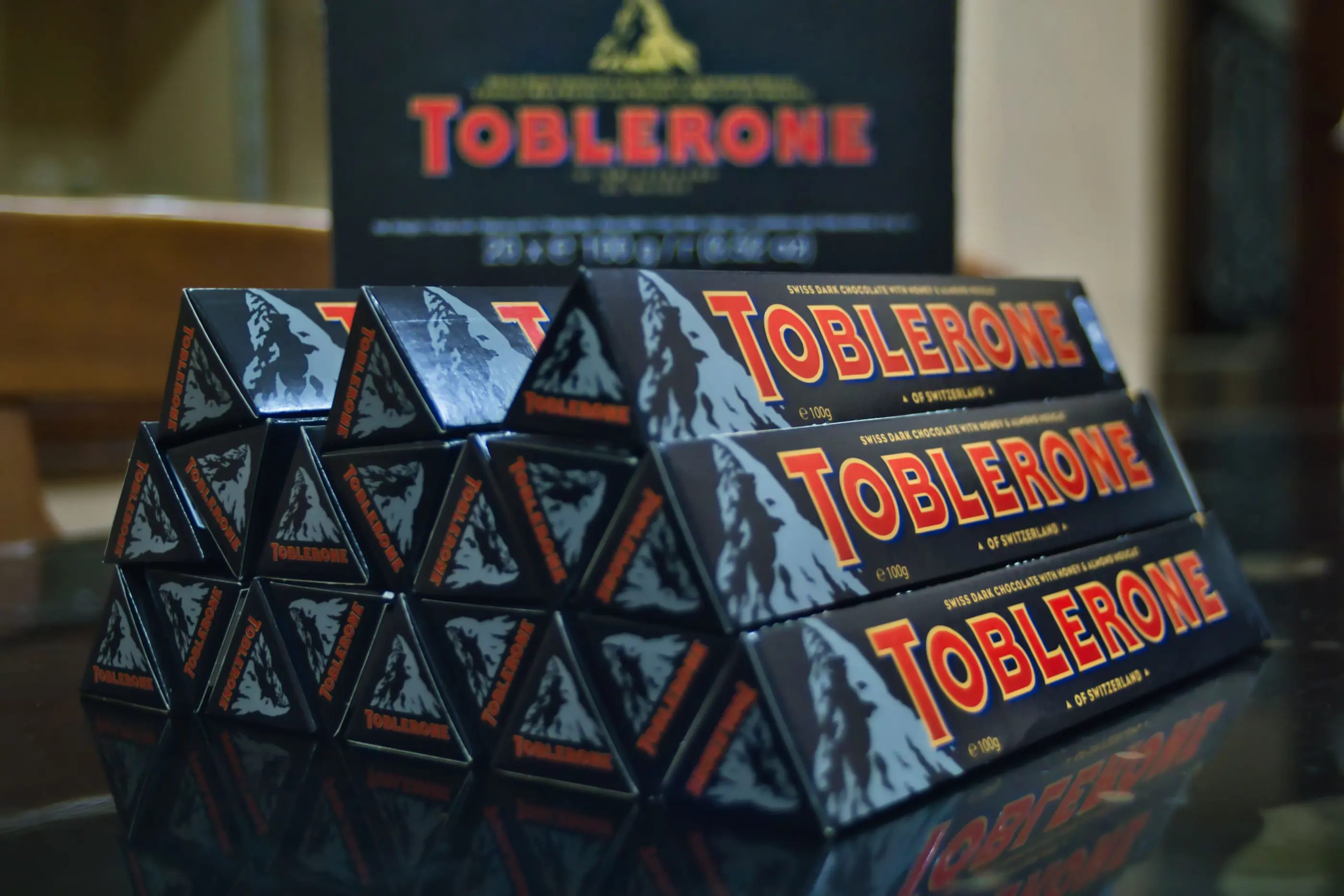 Stacked bars of Swiss chocolate, the industry that sells 192,548 tonnes a year and polished visitor centres